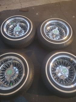 13x7 cross lace chrome rims  with Zenith knockoffs great condition