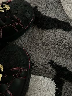 Adidas superstar black n pink stitching