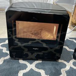 Smal 1/2 circle Whirlpool microwave 