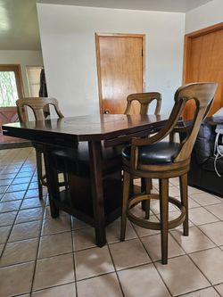 Adjustable table with 3 high chairs