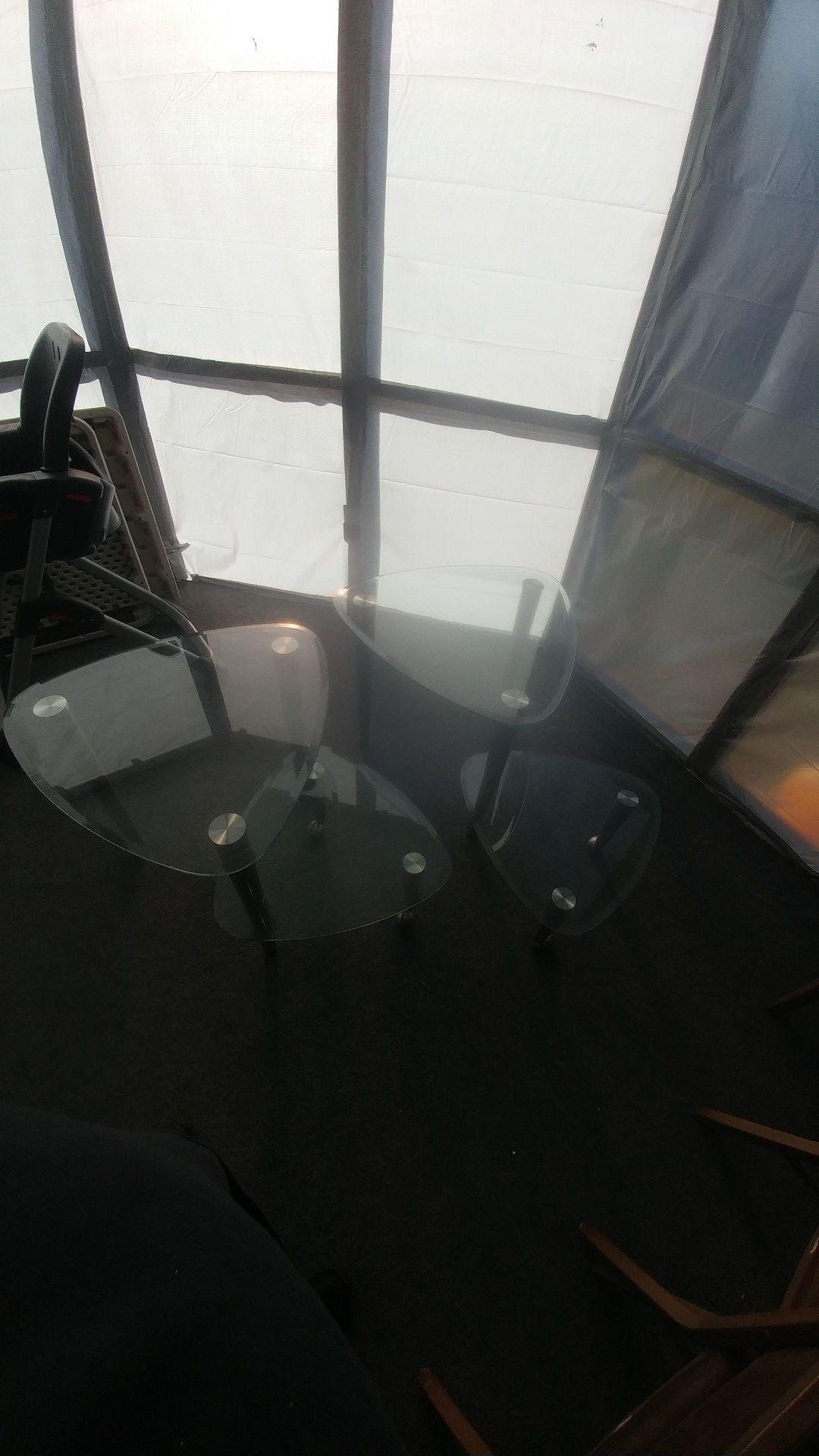 2 glass and stainless end tables