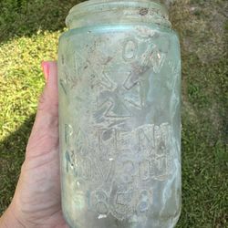 Antique glass Mason Jars 