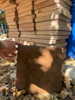 Square red concrete patio stone