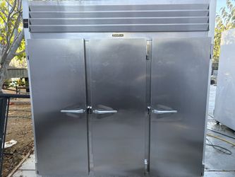 Traulsen G31010 115V G-Series Solid Door 3-Section Reach-In Freezer