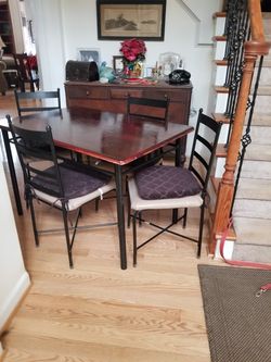 Kitchen table with four matching chairs