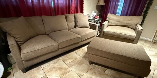 Free Tan sofa with pillow and oversized chair with ottoman