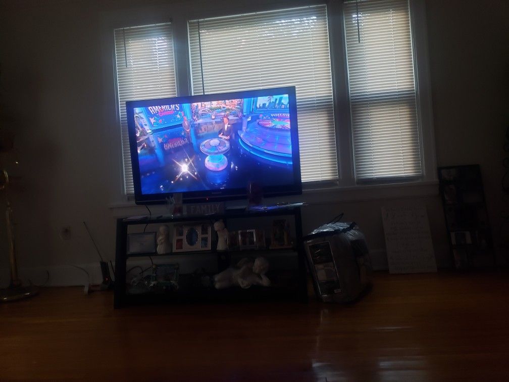47 inch panasonic tv with tv stand fits a 60 inch tv