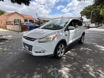 2014 FORD ESCAPE RUNS XLNT  SHIFTS XLNT HAS A TICKING SOUND NEEDS A GOOD CLEANING CURRENT REGISTRATION  CLEAN TITLE