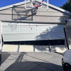 Garage doors cables off track