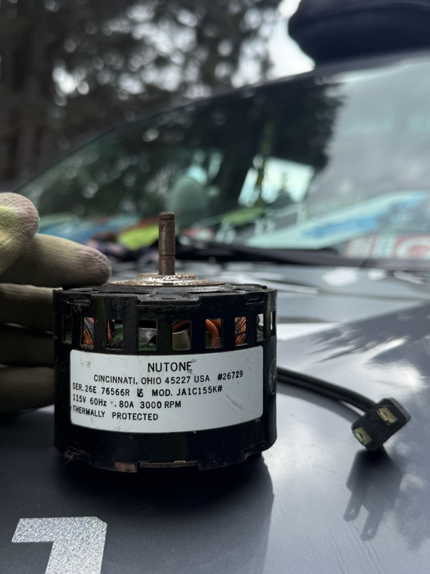 NuTone replacement motor for a bathroom exhaust fan. The model number is JA1C155K#.