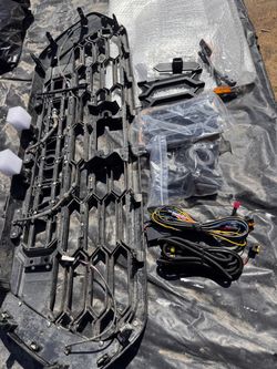 Toyota Tacoma Gen3 2021 aftermarket USED GRILLED with amber grill light