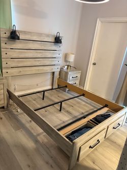 Queen bed frame with drawers and lamp