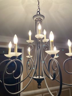 Beautiful Rustic Wrought iron Chandelier- with 9 lights. Perfect for foyer/ dining or living room.