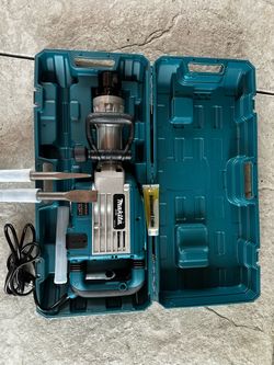 New Makita HM1304B demolition hammer. Has hard case, side handle, power cord, and two chisels. Also includes tube of Advanced Lube. Try before you buy