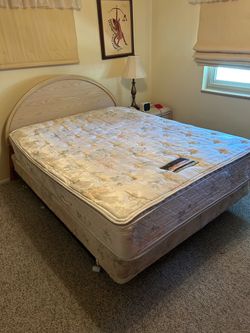 Queen size bed with two nightstands