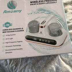 Cordless Bed Vacuum.