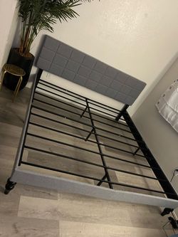 grey upholstered bed frame