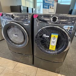 Electolux washer and gas dryer with pedestals