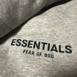Fear of God Essentials grey hoodie