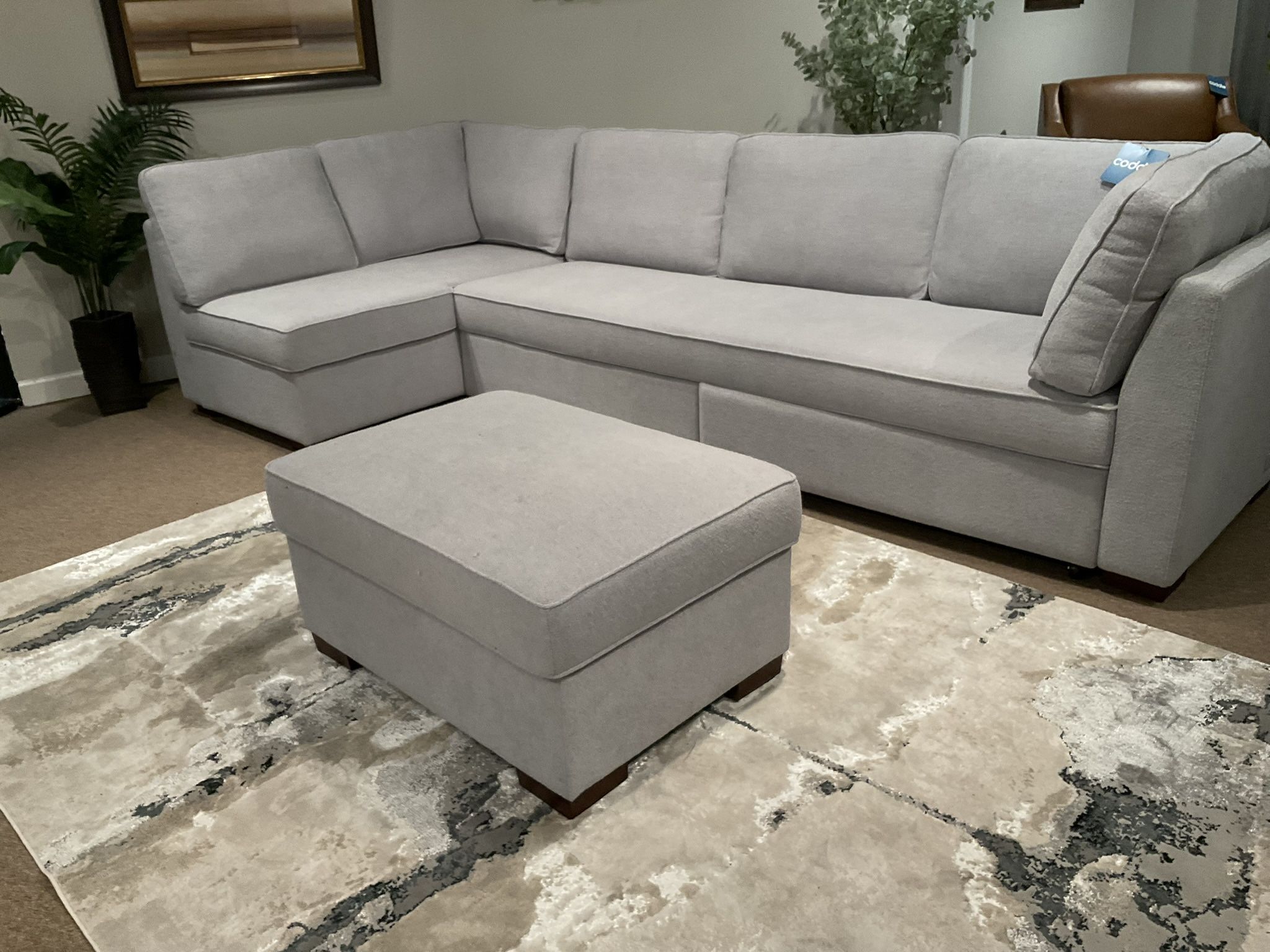 New light gray fabric upholstered doubler sleeper sofa by serta