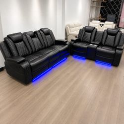 Black leather power 2 piece reclining sofa and loveseat set