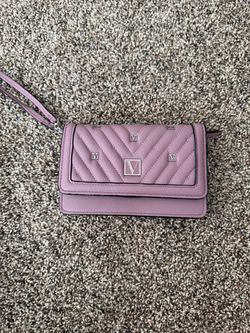 Purple quilted wallet with wrist strap