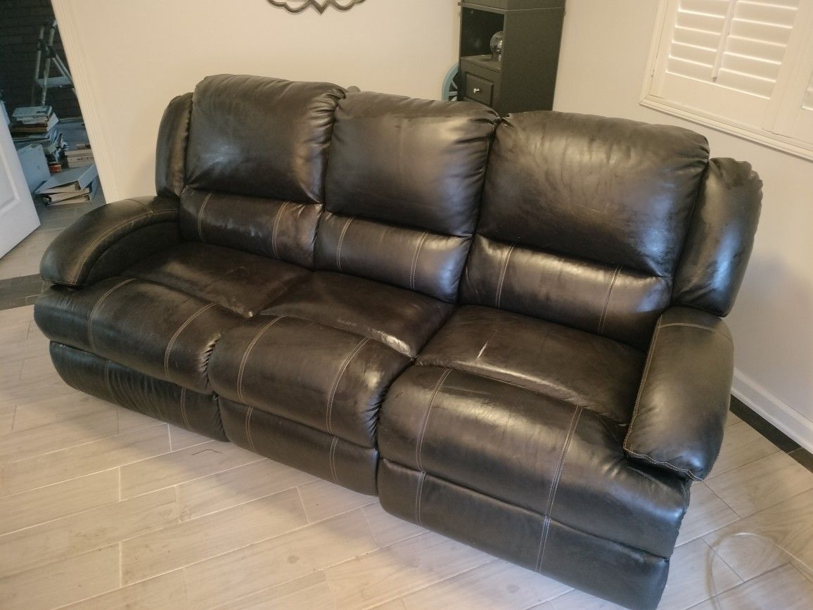 Jeromes Faux Leather Motorized Reclining Couch