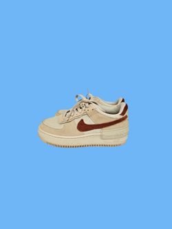 Nike Women's Air Force 1 Shadow sneakers in a "Shimmer," "Sanddrift," and "Mars Stone" colorway