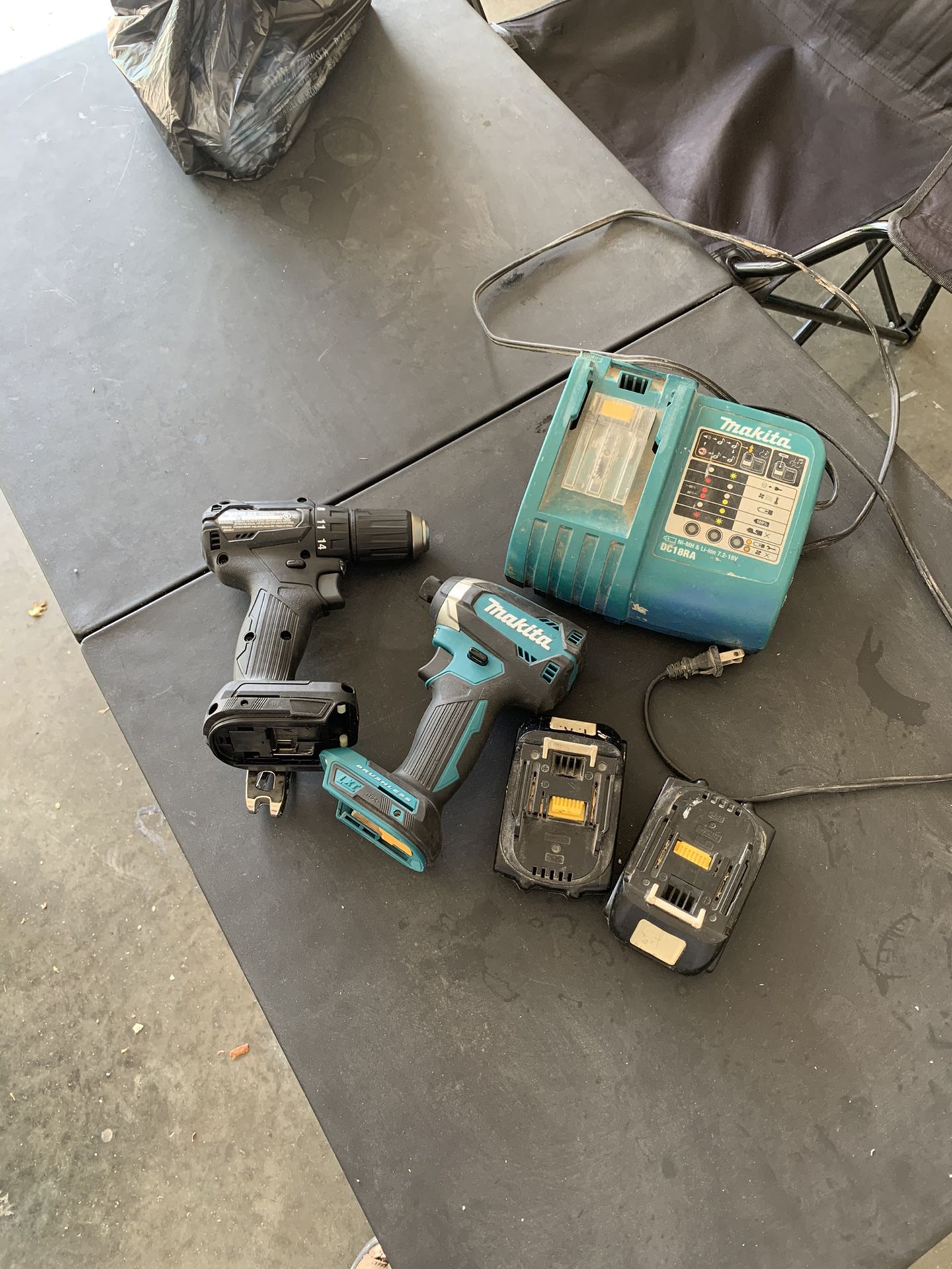 Makita 18v drill driver 1/2 and impact driver 1/4 are brand new but the batteries and charger are used !