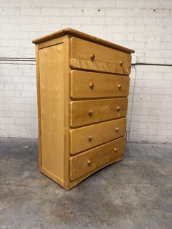 Delivery is available solid wood chest dresser with 5 storage drawers$370 OBO!