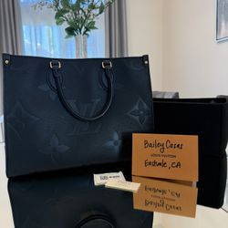 LV Onthego MM Black Empreinte 