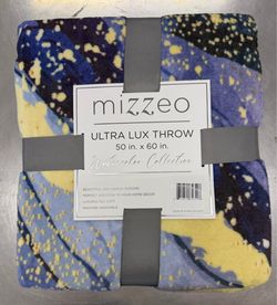 The mizzeo brand's ULTRA LUX THROW (Watercolor Collection), measuring 50 inches by 60 inches.