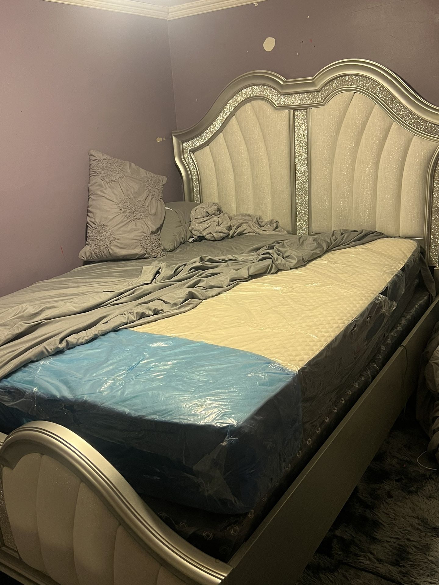 Queens size bed new mattress and box spring