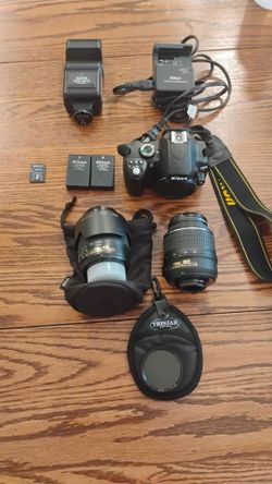 Nikon D60 w/ 2 lenses, filters.