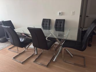 Mesa de vidrio con 6 sillas