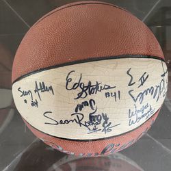 Autographed basketball University of Arizona team members