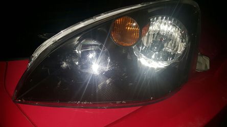Blacked housing altima head light 01-04
