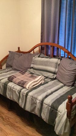 Oak Daybed with bedding and curtains