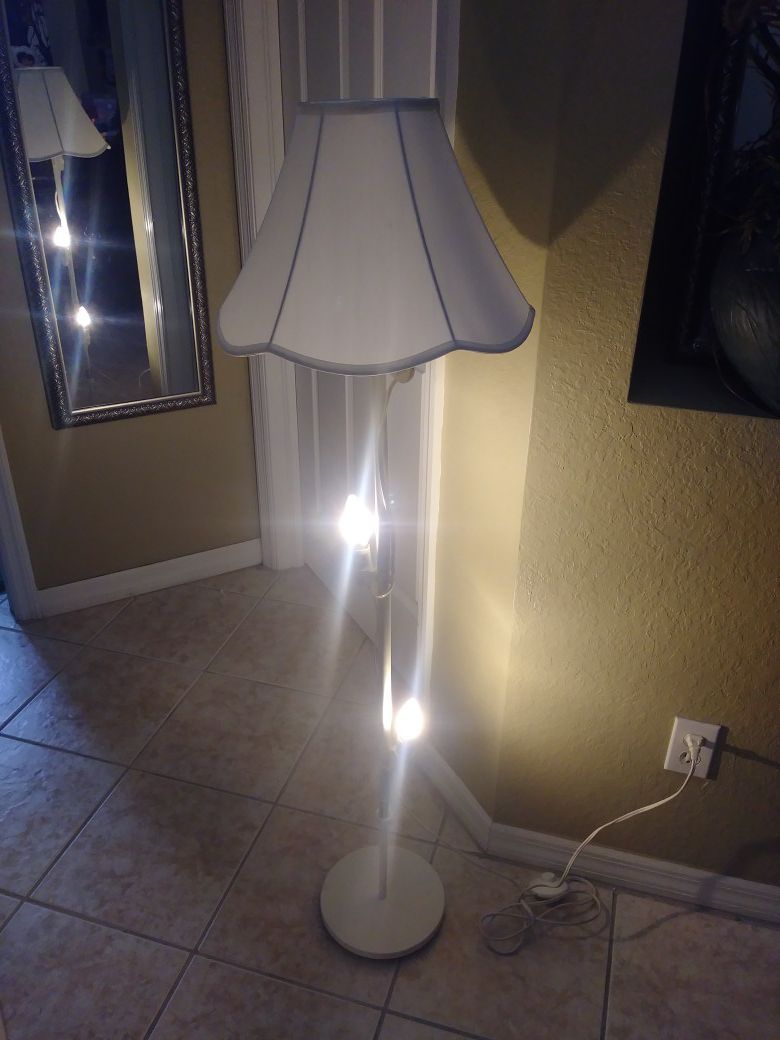 Unique white floor lamp. Shade not included