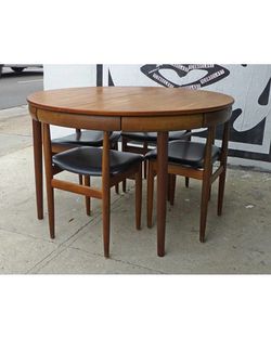 Hans Olsen hide-a-way dining room table and chairs