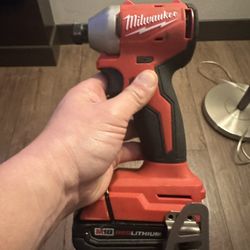 Milwaukee Cordless Impact  Drill with M18 Red lithium  5.0 amp Battery No Charger.