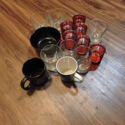 Lots of cups and glasses and bowl