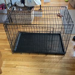 Large black metal dog crate
