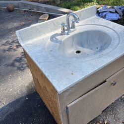 Bathroom sink with cabinet