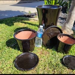 Sets of 3 pots with saucers $45