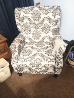Recliner in really condition white with black embroidery
