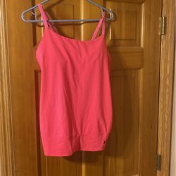 Pink women’s Under Armour Tank W Built In Sports Bra