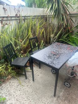 Black table and 2 chairs + Bench