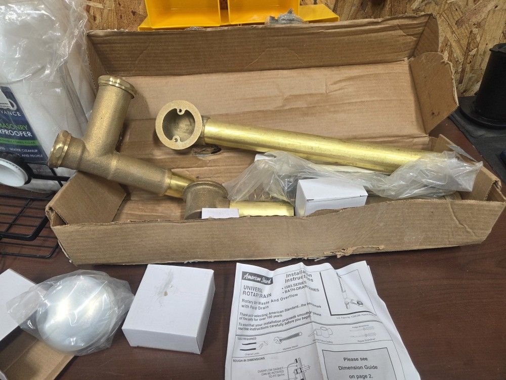 Universal brass tub drain