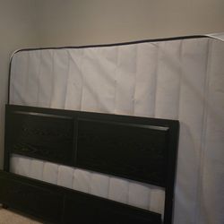 Queen size bed with headboard and mattress
